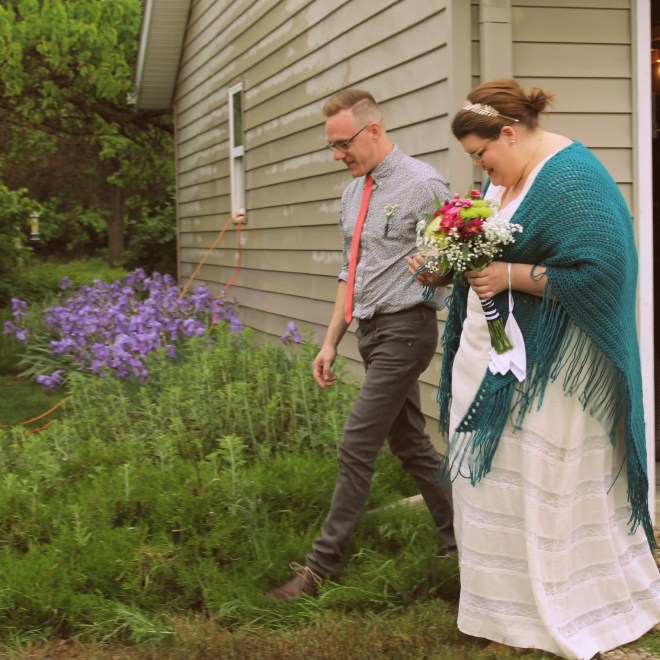 Here's an obligatory wedding photo of us walking one another down the aisle.
